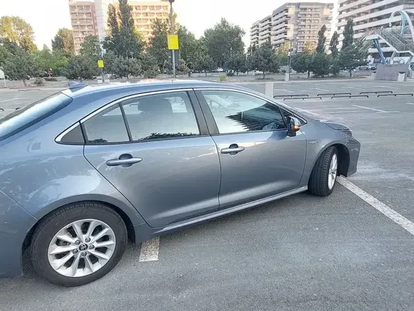 Toyota Corolla XII 1.8 HSD Business