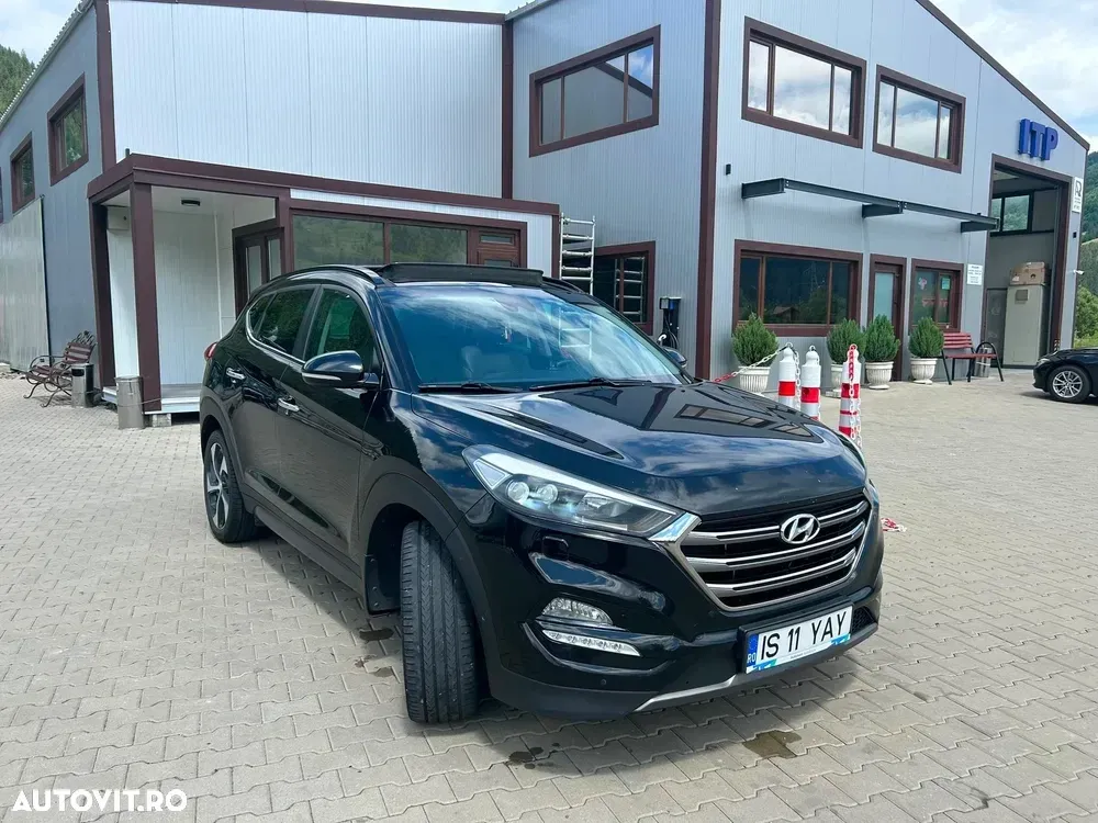 Hyundai Tucson III 2.0 CRDI 4WD 6AT Luxury+ — imagine 6