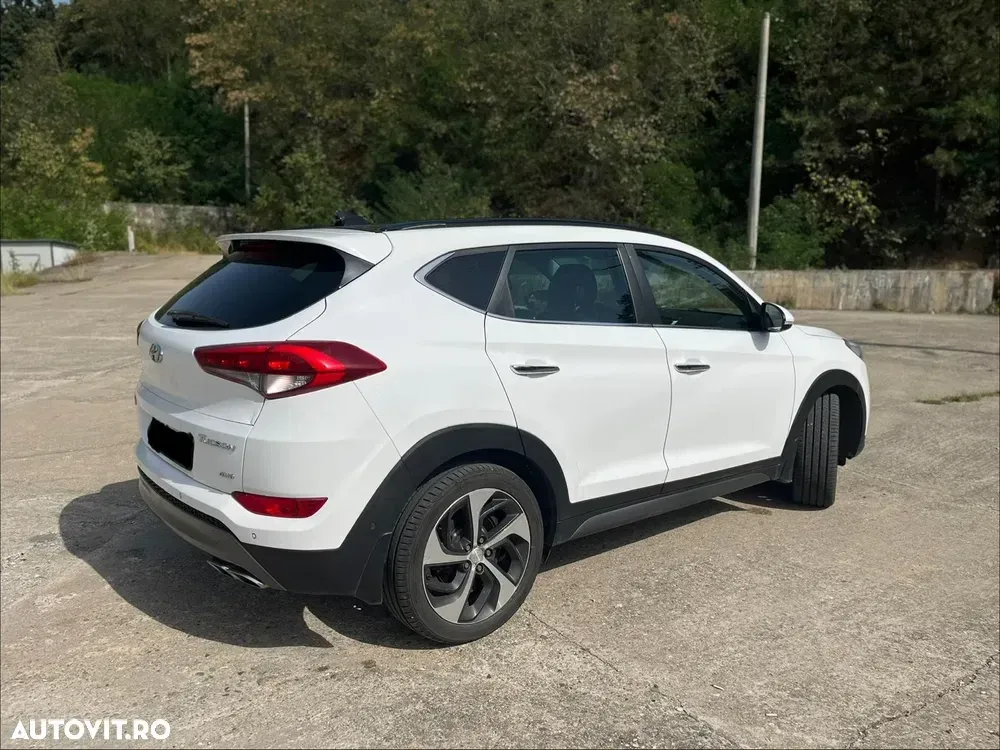 Hyundai Tucson III 2.0 CRDI 4WD 6AT Luxury+ — imagine 4