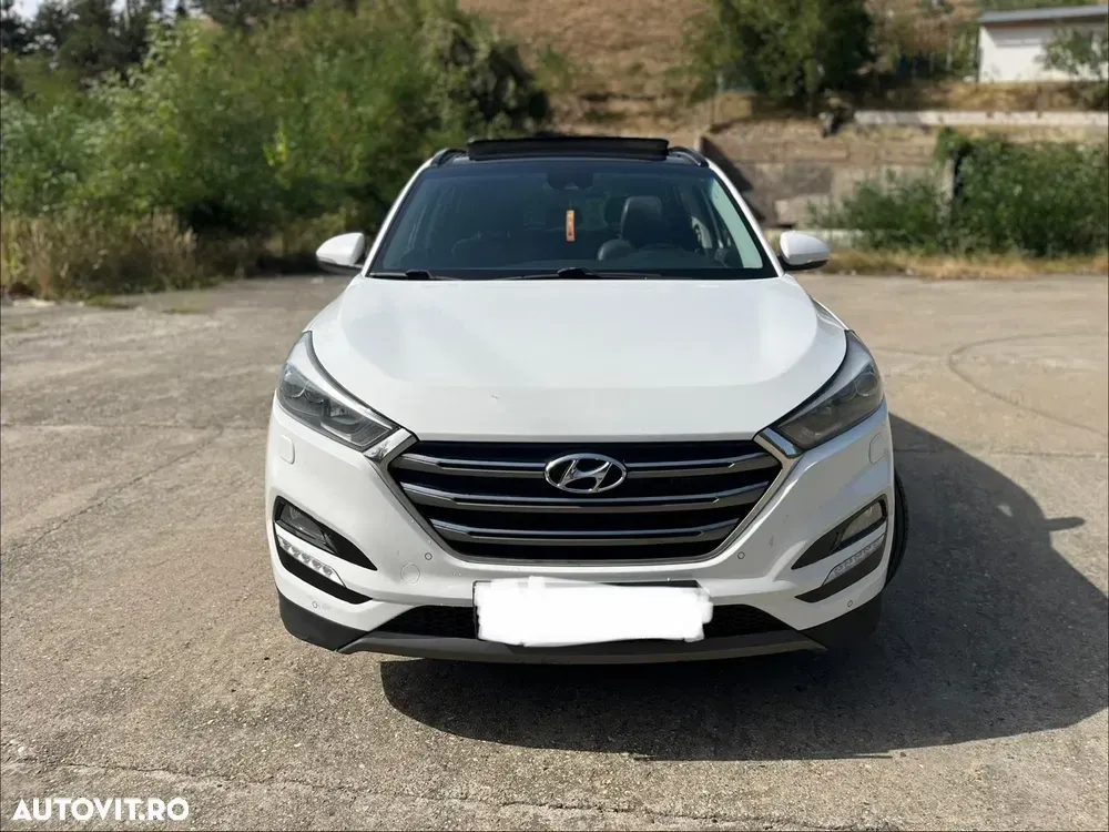 Hyundai Tucson III 2.0 CRDI 4WD 6AT Luxury+ — imagine 6