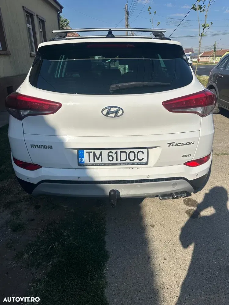 Hyundai Tucson III 2.0 CRDI 4WD 6AT Luxury+ — imagine 6
