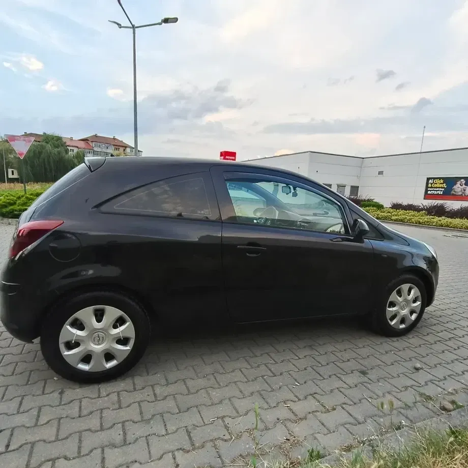 Opel Corsa D 1.0i Enjoy — imagine 4
