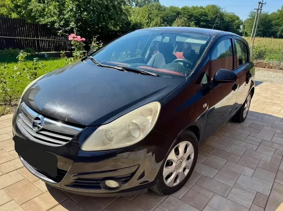 Opel Corsa D 1.2i Enjoy — imagine 4
