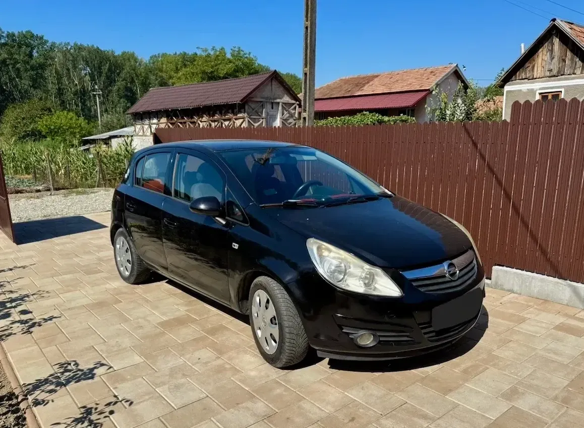 Opel Corsa D 1.2i Enjoy — imagine 10